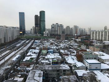 Aerial view of cityscape during winter