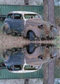 Close-up of abandoned car