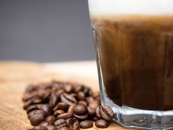 Close-up of coffee beans on table