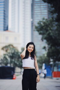 Woman standing in city