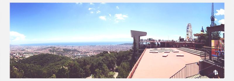 View of buildings against blue sky