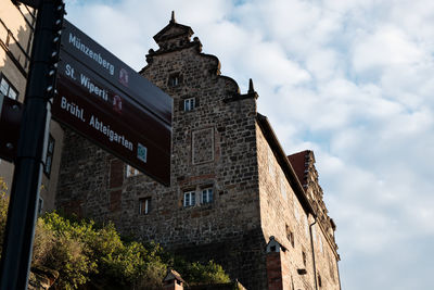 Low angle view of old building against sky