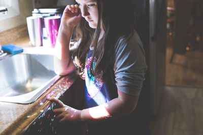 Girl standing at home