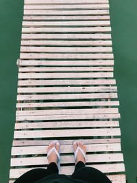 Low section of woman standing on floor