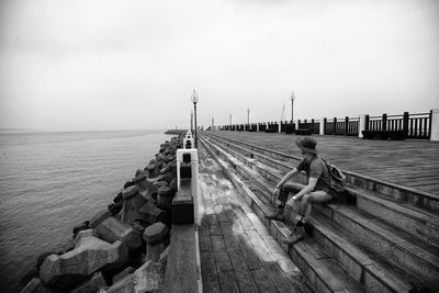 Pier on sea against sky