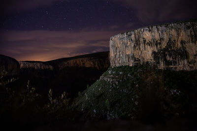 Beautiful views of the rocky wall of chulilla, village of valencia in spain at night