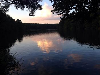 Scenic view of lake at sunset