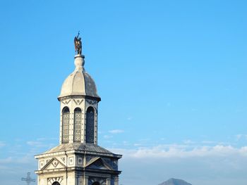 High section of church against blue sky