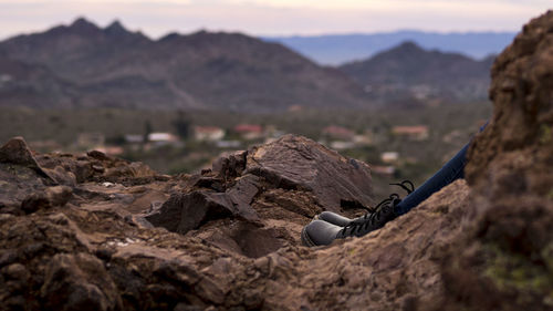 Close-up of rock against sky