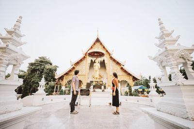 Statue in temple against clear sky