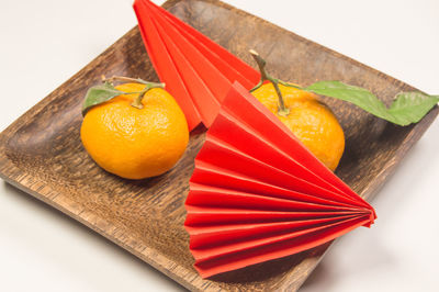 High angle view of orange fruit on table