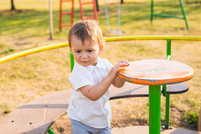 Boy playing in playground