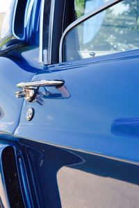 Close-up of vintage car on side-view mirror