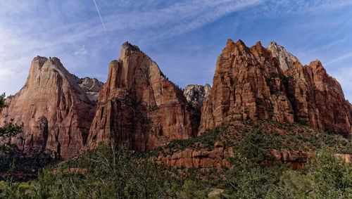 Low angle view of rock formation against sky