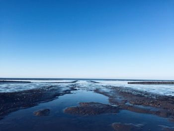 Scenic view of sea against clear sky