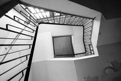 Directly below shot of spiral staircase of building