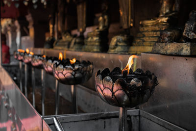 Burning candles in temple