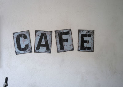 Close-up of text on wall