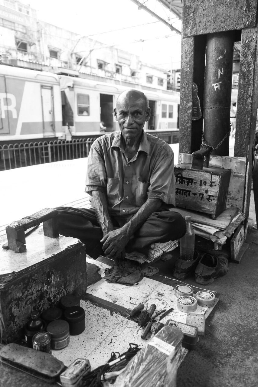 real people, one person, mature men, front view, mature adult, outdoors, day, people