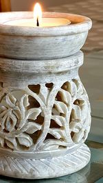 Close-up of candles on table