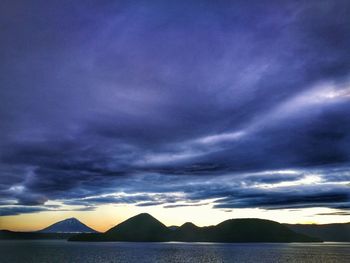 Scenic view of dramatic sky over sea