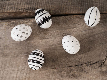 Close-up of painted easter eggs on wooden table