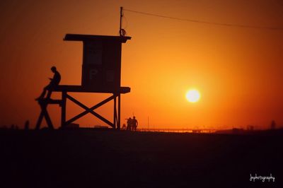 Silhouette of beach at sunset