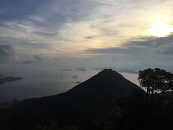 Scenic view of silhouette landscape against sky during sunset