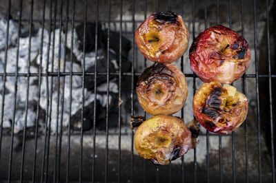 Grilled apples on ready to eat still placed on the grill