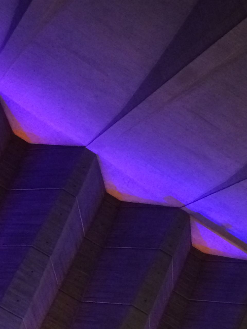 indoors, pattern, multi colored, illuminated, purple, low angle view, blue, design, no people, pink color, high angle view, built structure, architecture, night, ceiling, abstract, wall - building feature, sunlight, full frame, lighting equipment