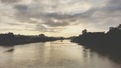 View of river against cloudy sky