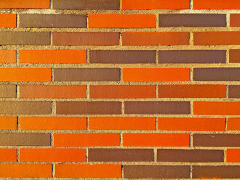 Full frame shot of orange brick wall