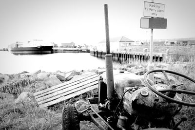 Abandoned truck on field against sky