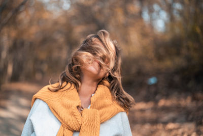 Portrait of a smiling young woman in winter