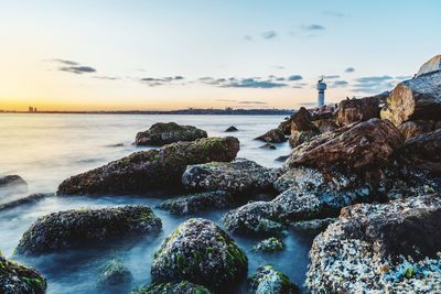 Scenic view of sea against sky during sunset