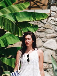 Portrait of woman standing outdoors