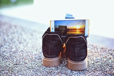 Close-up of shoes on table