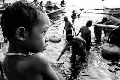 Boy playing with arms raised