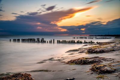 Scenic view of sea against sky during sunset