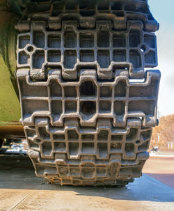 Close-up of machine part on field