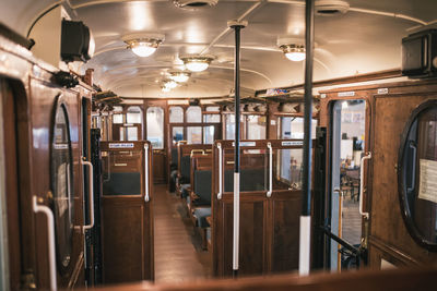 Interior of empty illuminated train