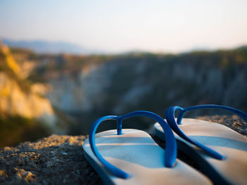 Close-up of eyeglasses on rock