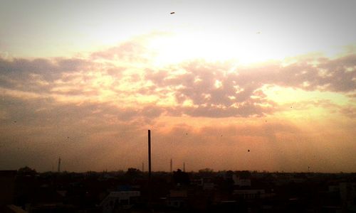 View of cityscape at sunset