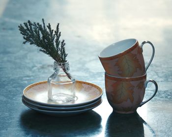 Close-up of coffee cup on table