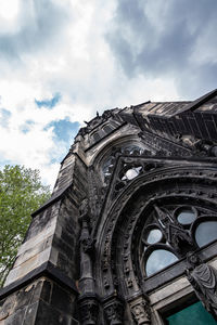 Low angle view of ornate building against sky