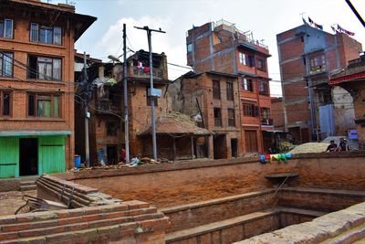 Low angle view of buildings against sky