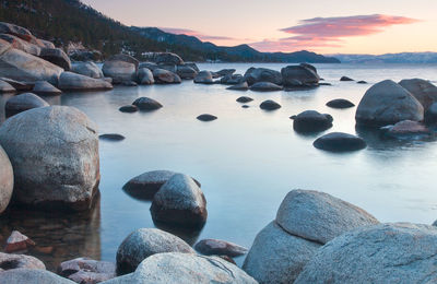 Scenic view of sea against sky at sunset