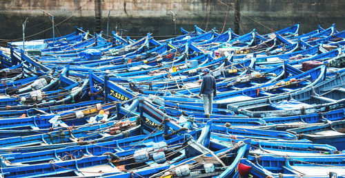 Boats moored at harbor