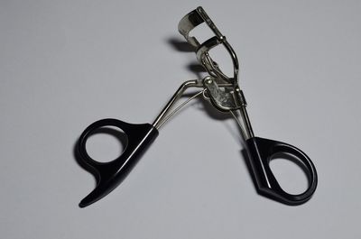 High angle view of chain against white background