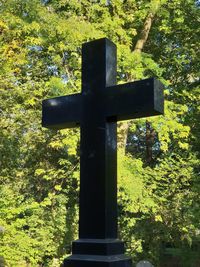 View of cross in cemetery